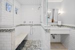 Primary ensuite with tiled walk-in shower